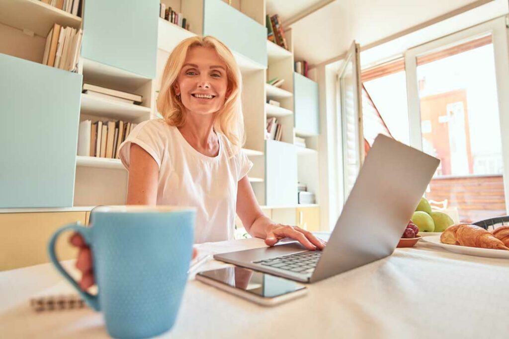Confident mom working from home on her laptop